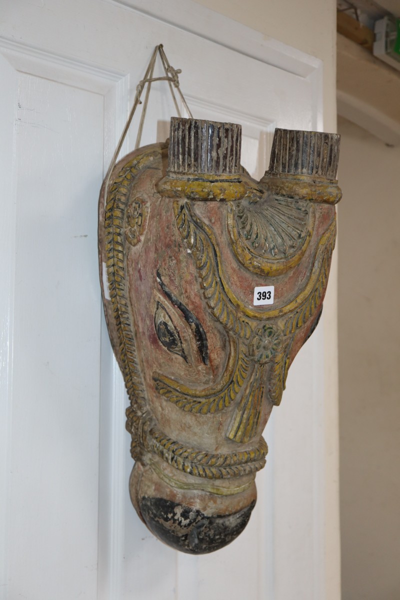 An Indian carved horses head